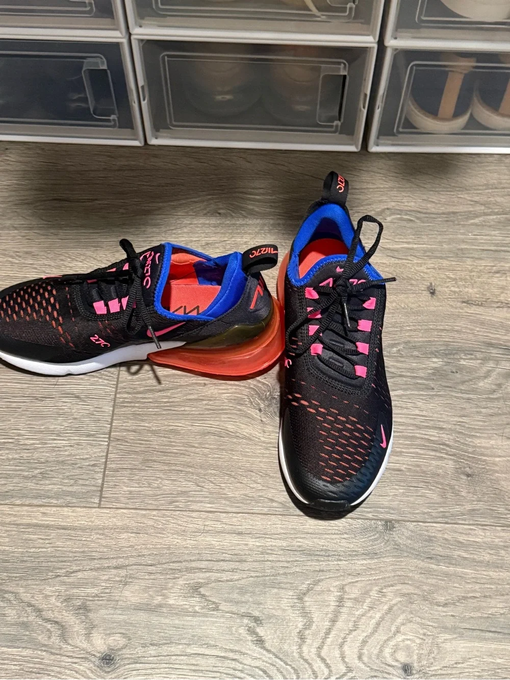 Nike Black Shoes with Pink Accents and Blue Lining